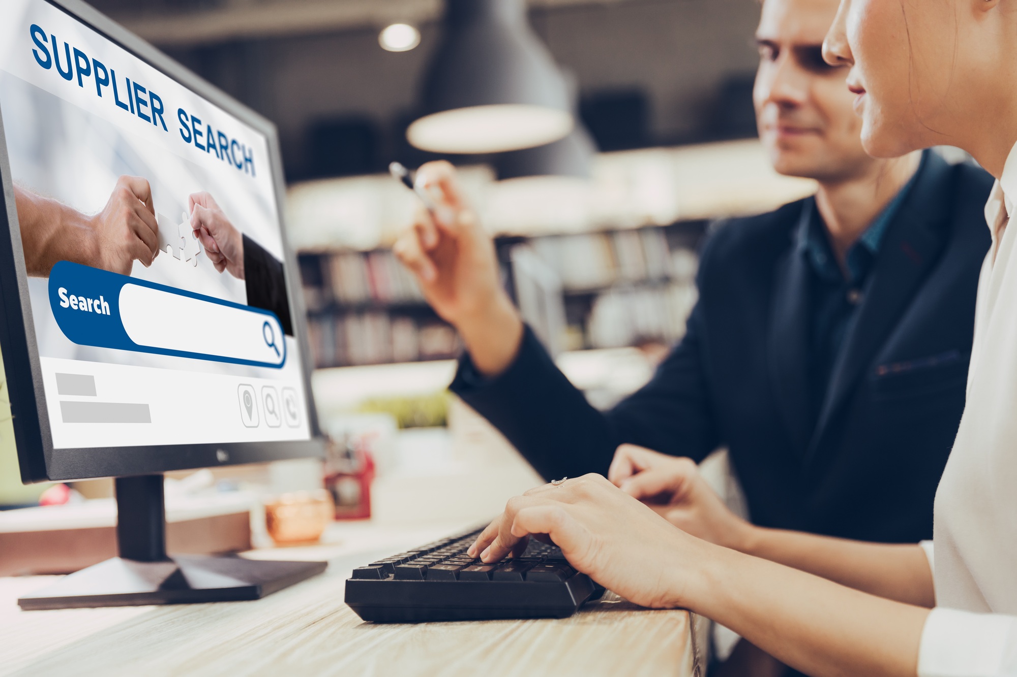 teamwork people working in office using internet website searching supply chain partner