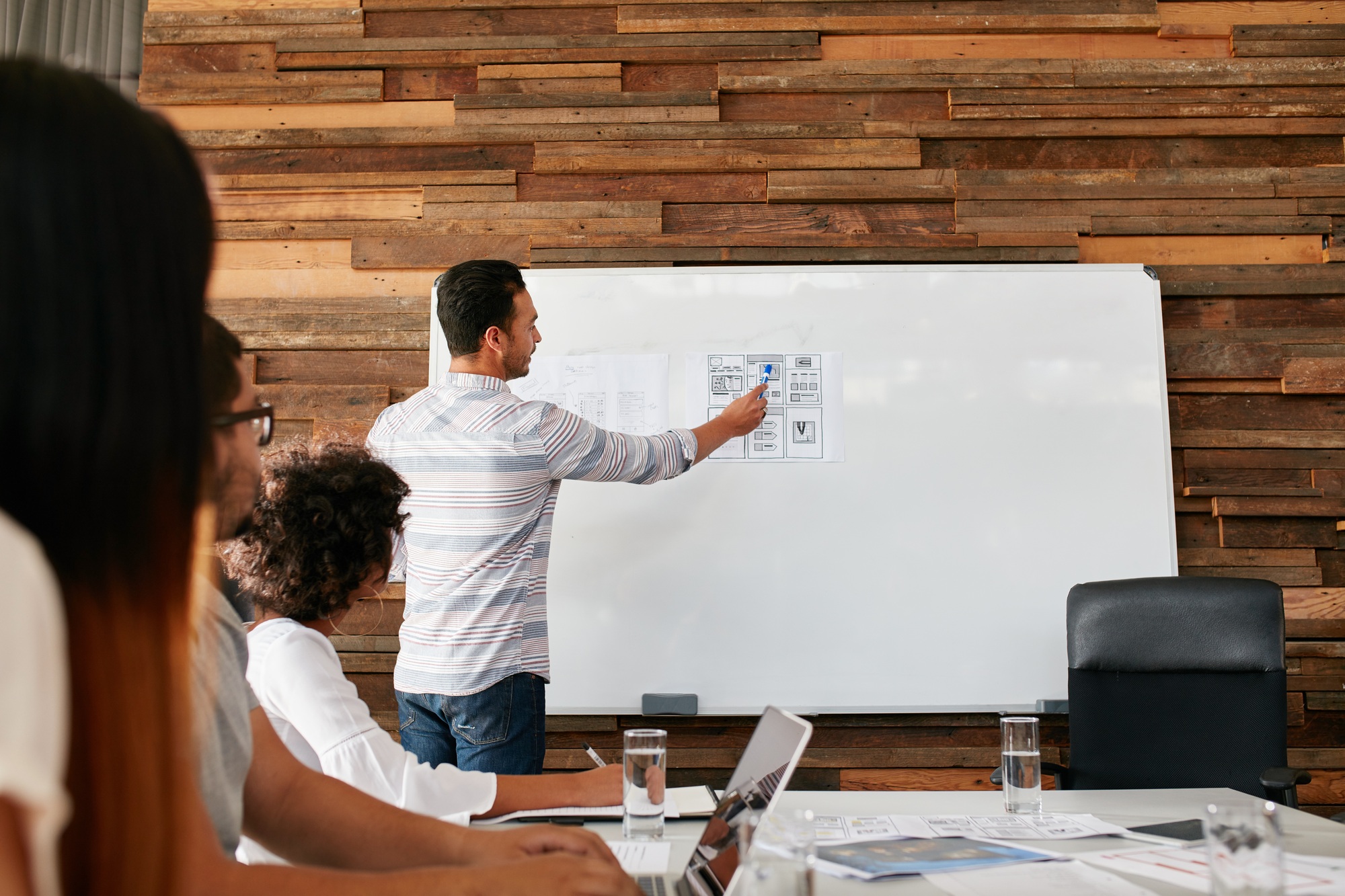 Brainstorming at a meeting room of creative agency