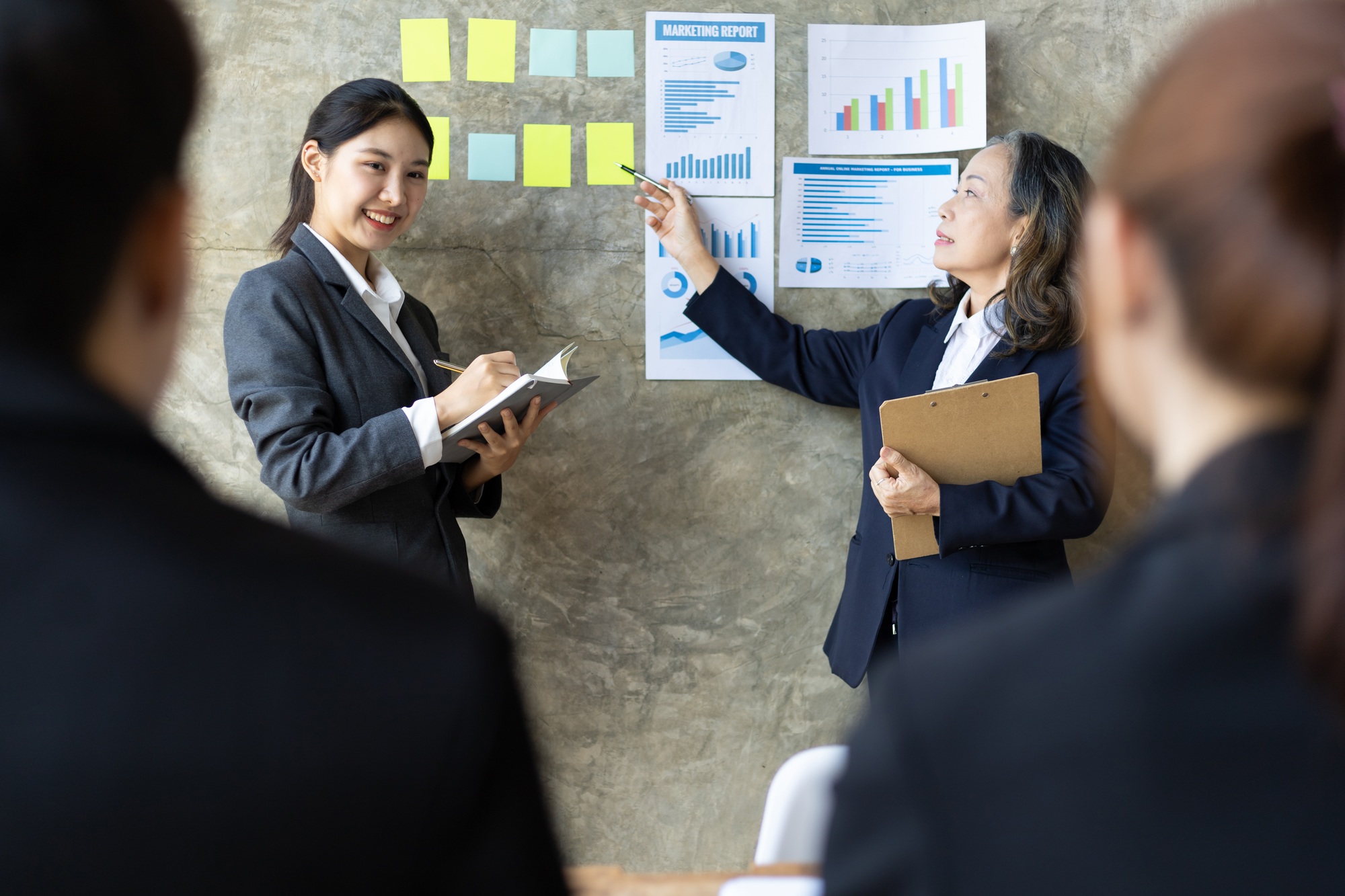Business meeting. Senior managers talk to employees in the conference room.