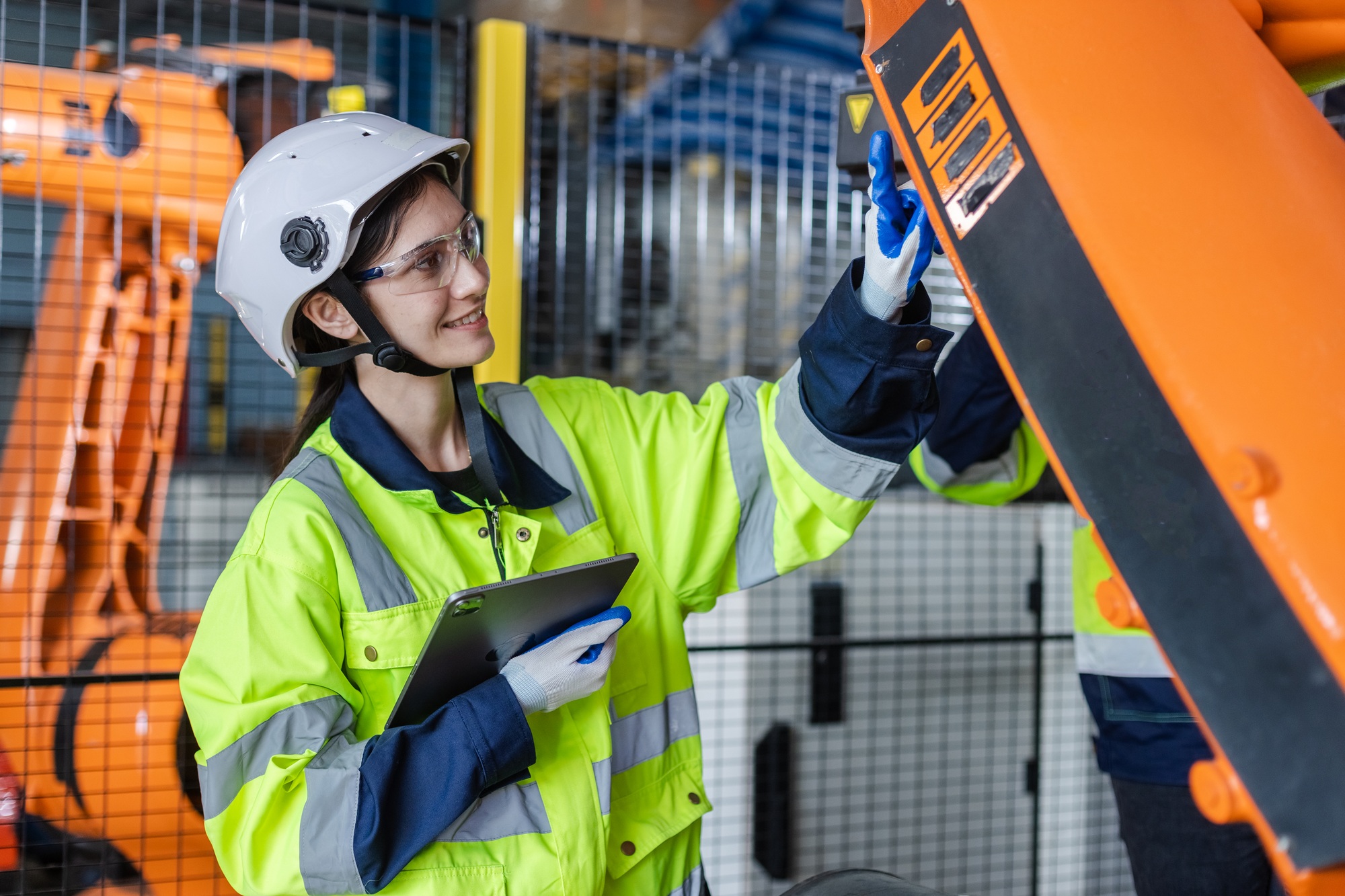 Female technician modern factory, Technical supervisor of robot operation department.