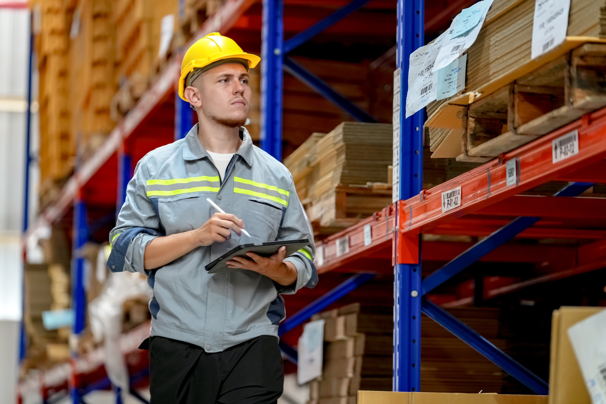 Warehouse Industrial supply chain and Logistics Companies inside. workers on inventory check.