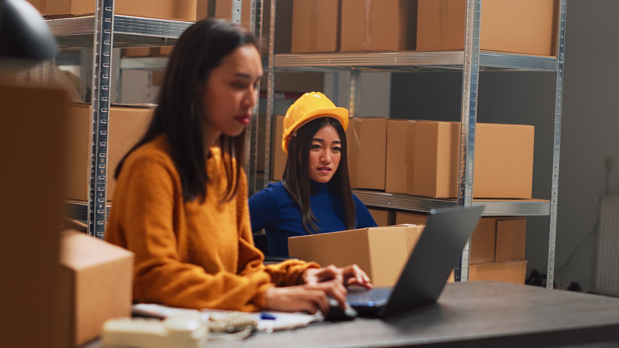 Young woman with disability working with supply chain